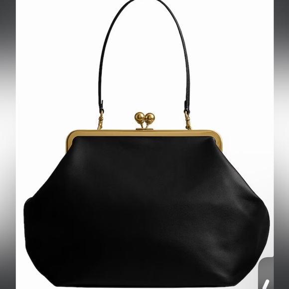 Coach Handbags - Brand new in packaging. NWT Coach Kisslock black Leather Bag with Gold.